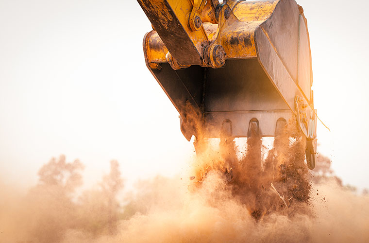 Excavator creating dust